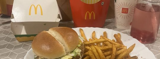 A McAloo Tikki Burger served with Peri-Peri fries